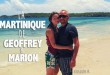 Geoffrey et Marion, un jeune couple qui vit en Martinique, se tient debout devant la mer des caraïbes en souriant sur une plage de cette île française des Antilles